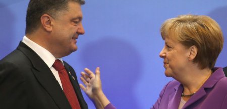 Порошенко рассказал Меркель о боевиках, мешающих доставке украинской гумани ...