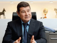 Онищенко объяснил свое частое отсутствие в Украине