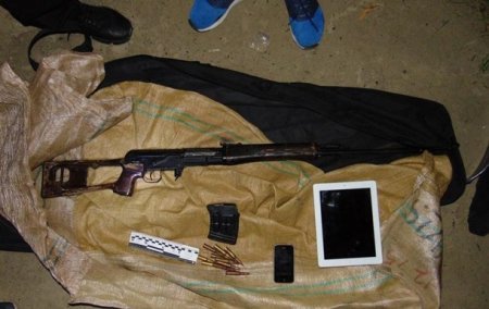 В Киеве полиция задержала мужчину, хранившего дома снайперскую винтовку и а ...